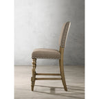 Set da pranzo altezza bancone con tavolo a 7 pezzi finitura legno flottante e sedie con borchie